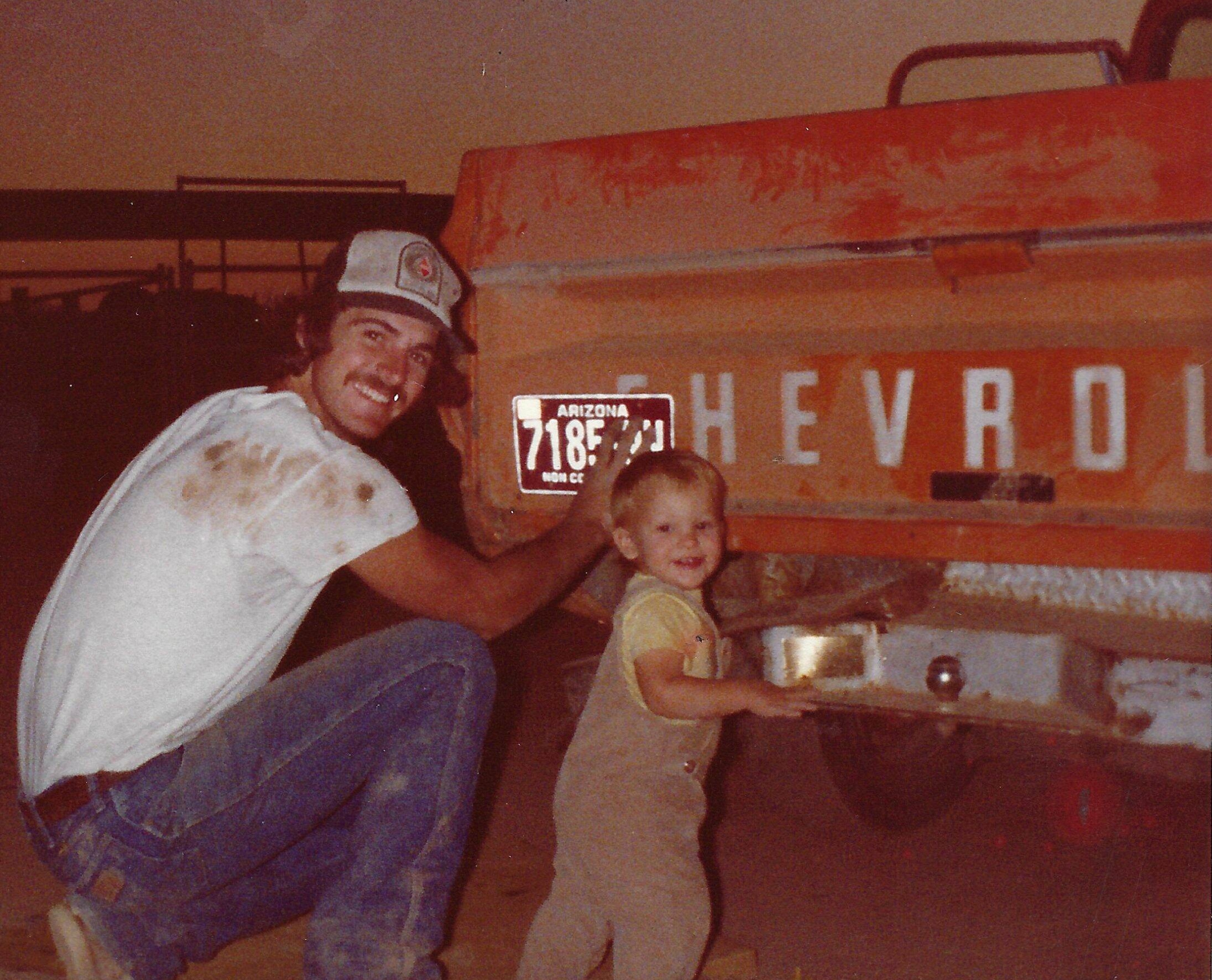 Young Kable and dad with the truck